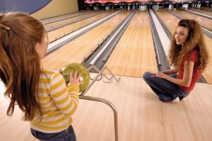 Mother and Daughter Bowling